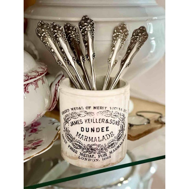 A splendid and elegant set of six dessert spoons (length 18 cm) in exquisitely silvered metal, a true masterpiece of early...