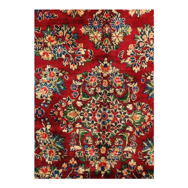 Antique Persian Sarouk rug with Art Nouveau style features an impressive all-over floral design rendered in a rich color...