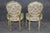 A refined and elegant pair of French Louis XVI style side chairs, beautifully crafted with neoclassical restraint and...