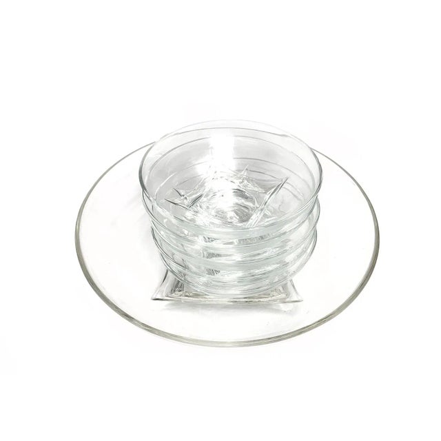 Vintage mid century 6 piece ultra-modern glass serving bowl set, from the 1950's. This set includes 1 large bowl and 5...