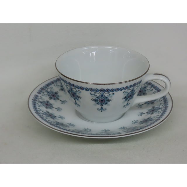 This lovely tea cup and saucer set is made of bone china. This set is stamped as being made by Noritake Nippon, Toki...