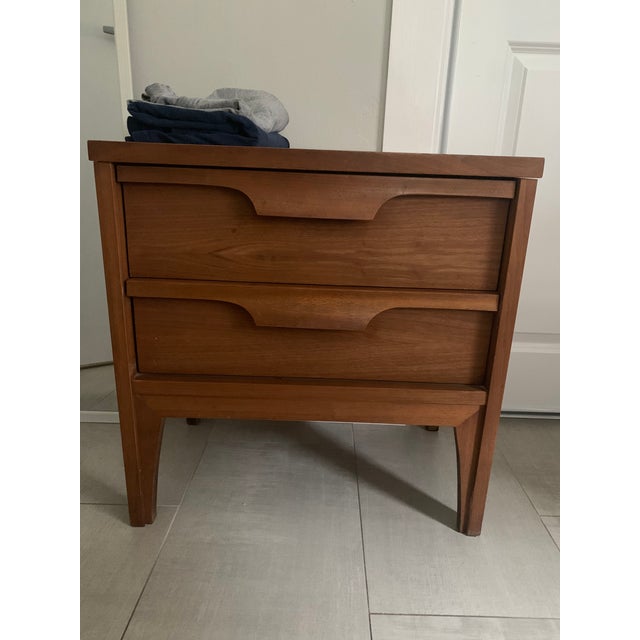 Gorgeous Johnson Carper n ight stand, in a Laminate Walnut finish, makes a great addition to any bedroom.