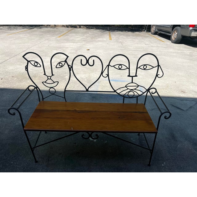 Up for consideration is a beautiful vintage metal and wooden Jon Risley figurative bench. This would look lovely in your...