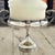 An exceptionally stunning vintage English silver plated standalone single pedestal candleholder dating to circa 1940....