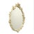 Delightful cream oval wall mirror with old gold highlights featuring flowers, berrries/grapes and swirls made by the...