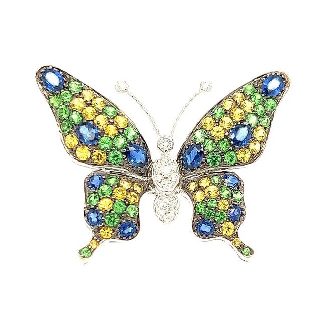 18k Butterfly Brooch with 0.17 carats of Diamonds and 5.04 carats of Tsavorites and Sapphires 11.16g