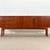 Conceived in Scotland in the early 1970s, this elegant sideboard was designed by Tom Robertson and Val Rossi for the...