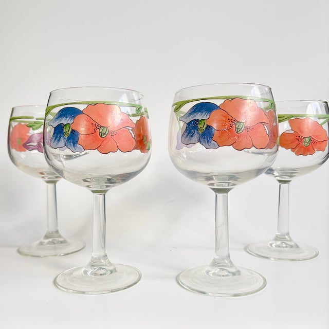A rare and vibrant set of four vintage goblets by Villeroy & Boch in the iconic “Amapola” pattern. Featuring bold floral...