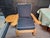Side fold up attached table. 2 reclining positions besides the upright position.