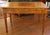 Continental walnut writing table desk, late 19th century. Likely French or Italian. Rectangular form raised on straight,...