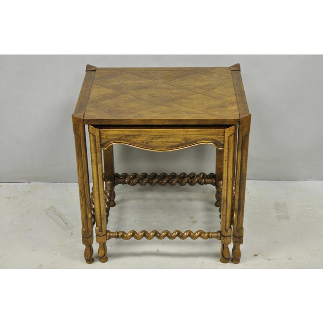 Vintage Baker Barley Twist Oak Parquetry Inlay Nesting Step Lamp Side Tables. Circa Mid 20th Century. Measurements: 22.5"...
