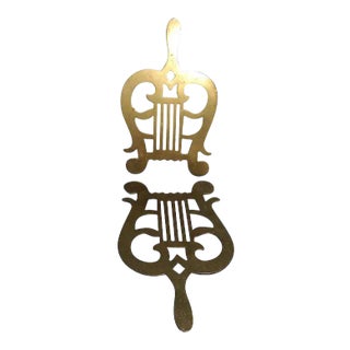 19th Century English Regency Brass Hand Cast Trivets in the form of Lyres or Harps - a Pair For Sale
