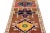 This exquisite vintage runner rug has been meticulously hand-knotted from high-quality wool. It features a rich brown...