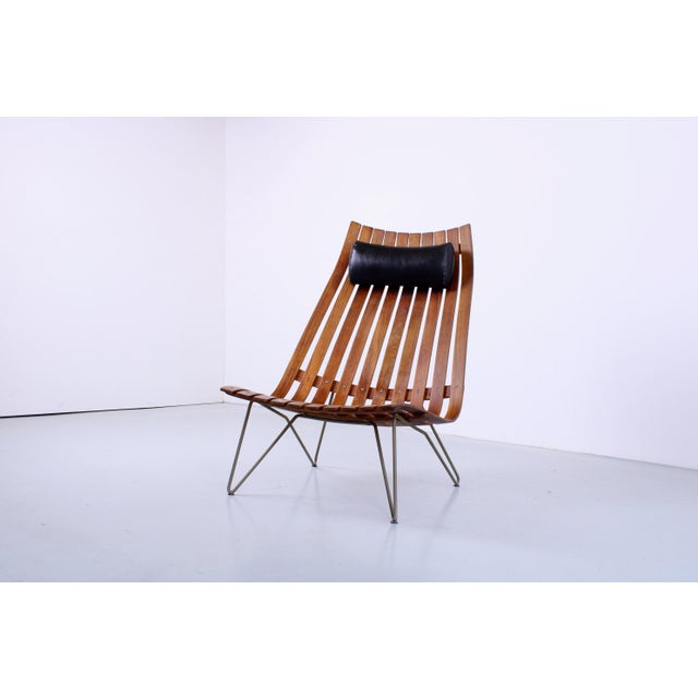 Desirable large easy chair from the Scandia series by Hans Brattrud. Very expressive design, and most symbolic for post-...