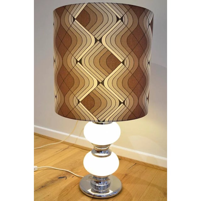 Beautiful table or floor lamp from the 1960s - 1970s of the company Sölken Leuchten. The lamp has an illuminated chrome...