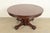 An outstanding antique Victorian or American Empire split pedestal extension dining table Attributed to R.J. Horner & Co....