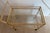 Metal bar cart, hand painted to resemble bamboo. Two glass shelves. On castors. Fantastic poolside, sunroom! Very good...