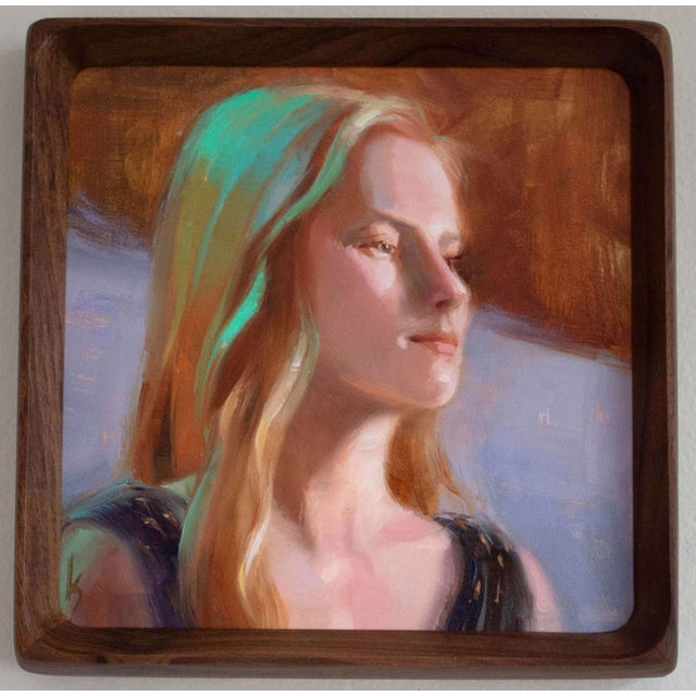 This oil painting on panel captures a serene portrait of a woman dressed in a polka dot dress, her gaze contemplative...
