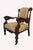 Stately 19th-century American Victorian Renaissance Revival accent armchair with a commanding silhouette. Crafted from...