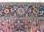 A stunning early 20th century Persian Heriz rug with the most wonderful and elaborate pattern containing a large central...
