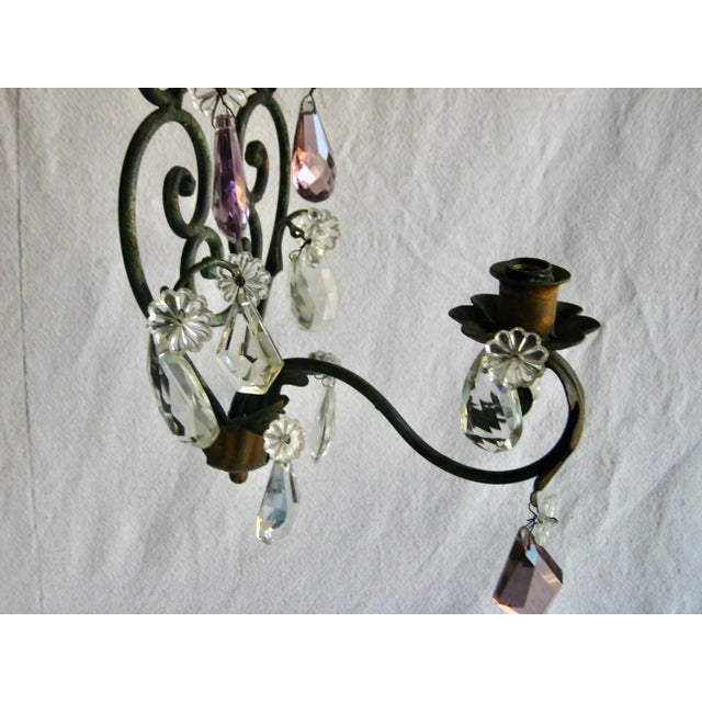 Lovely pair of sconces typical of what was done in France during the 1920 to 1940 , the mix of iron and crystal is a very...