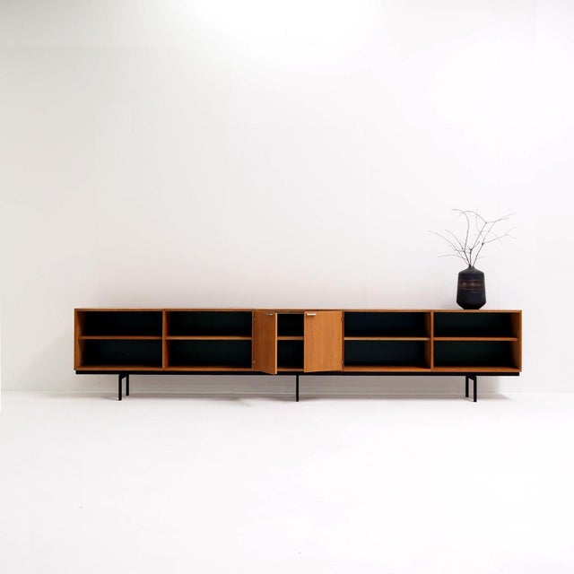 Take a look at this extra long oak sideboard, designed in the 1960s by Cees Braakman for Pastoe. It is a beautiful example...