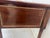 Louis xvi style desk in mahogany and mahogany veneer it rests on four tapered legs with recessed fluting four drawers in...