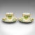 This is a set of 4 antique coffee cups. An English, bone China decorative drinking can and saucer with green grape...