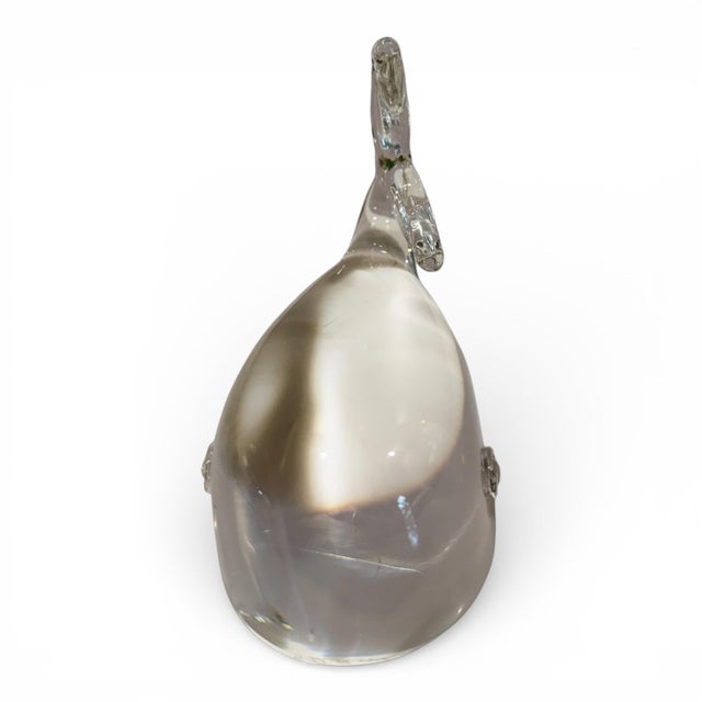 An elegant signed Steuben crystal whale sculpture, measuring approximately 5.5 inches in length. This beautifully sculpted...