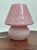 Beautiful mushroom-shaped table lamp. Italy, 1970s. Made entirely of pink Murano glass. Spirally striated and speckled...