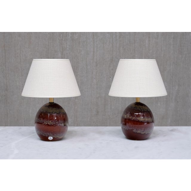 This rare pair of table lamps was designed by kent eriksson in collaboration with carl-harry stålhane and produced by...