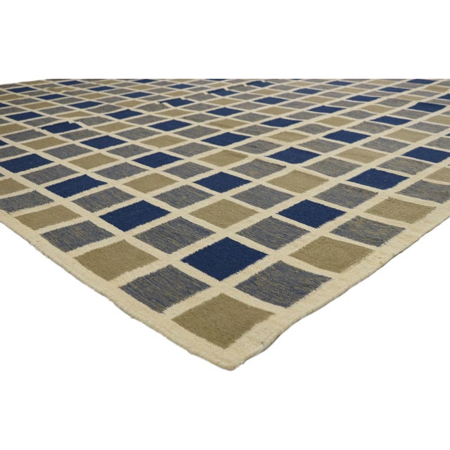 74923 Vintage Turkish Kilim Area Rug with Square Buffalo Plaid Pattern. With its all-over simple square buffalo plaid...