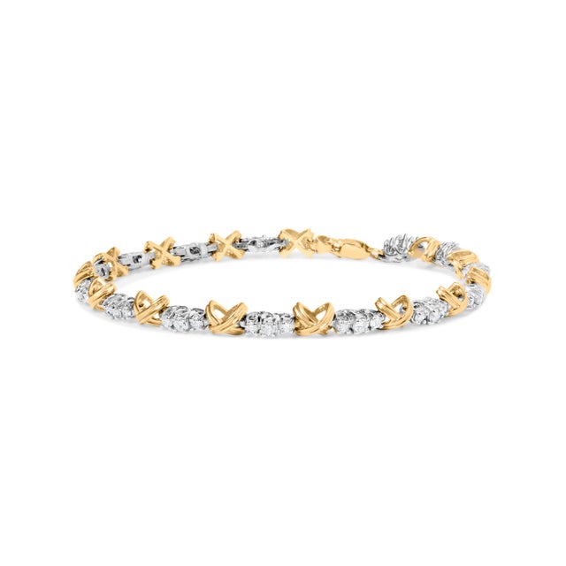 Discover the spellbinding allure of this 10K two-tone gold bracelet, where luxury meets a timeless aesthetic in a...