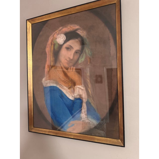 Sweet little “Mona Lisa smile” on this one. A beautifully done pastel portrait after François Delarue, featuring a dark-...