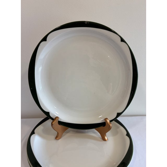 A charming vintage find for the collector of American diner and hotel china — this set of three McNicol China plates...