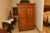 I'm very pleased to present for sale this extremely handsome hand-carved solid oak armoire wardrobe cabinet with the...