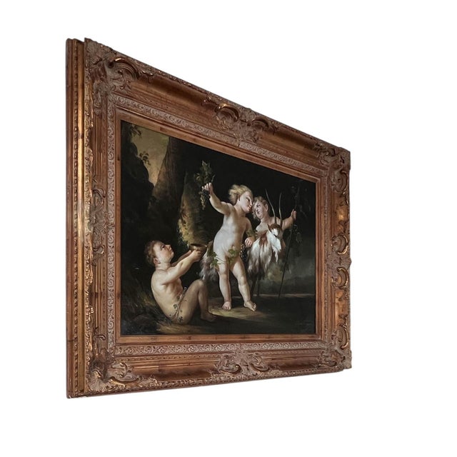 Step into a scene of classical merriment with this oil on canvas painting, beautifully presented in an exquisitely ornate,...