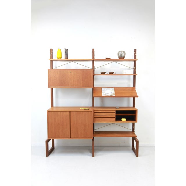 Freestanding 2-strip teak "Royal System" by Poul Cadovius for sale! This freestanding set can be installed against a wall...