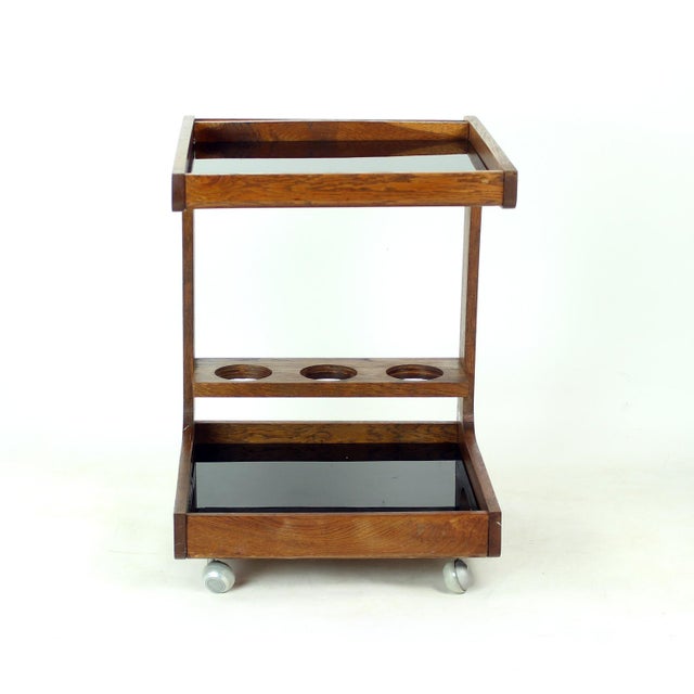 Elegant mid-century modern bar cart / drinks trolley, dating from circa the 1960s, produced in Czechoslovakia. The...