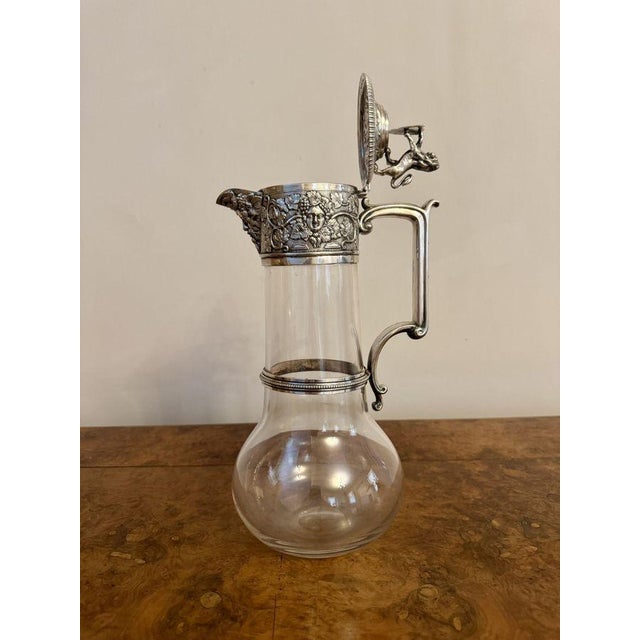 Outstanding quality antique Victorian claret jug by Elkington & Co, having a quality late Victorian clear glass and silver...