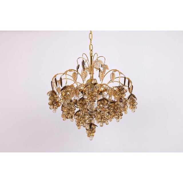 Large midcentury gilt brass chandelier with crystal glasses, made by palwa, germany, manufactured, circa 1970-1979. High...