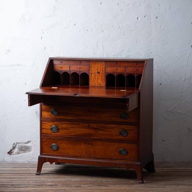 A Connecticut mahogany slant front desk on french feet with original 15 star eagle pulls, circa 1800. Some provenance and...