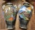 Pair of polychrome glazed earthenware and gold vases - Japan, Satsuma kilns Decorated with traditional Japanese figures,...