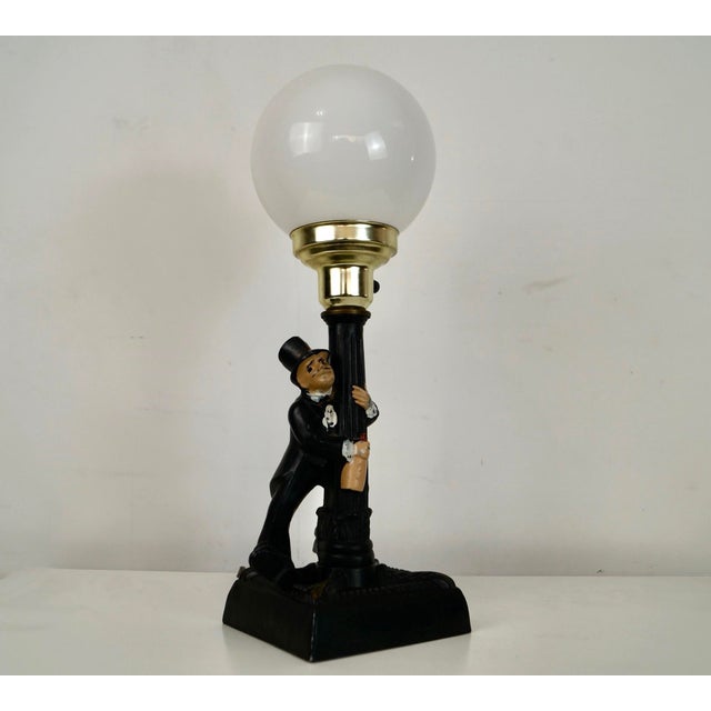 Vintage 1950's Mid century Modern table lamp for sale. It's made of metal, and is a classic bar lamp. It has Charlie...