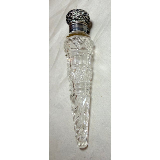 The antique 19th century Unger Brothers sterling silver and cut crystal perfume bottle is a stunning piece of Art Nouveau...