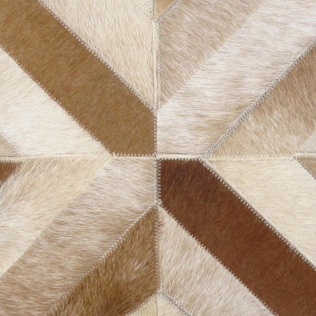 This luxurious Cowhide Throw Pillow is hand-cut and hand-stitched. Each panel is carefully selected for rich color and...