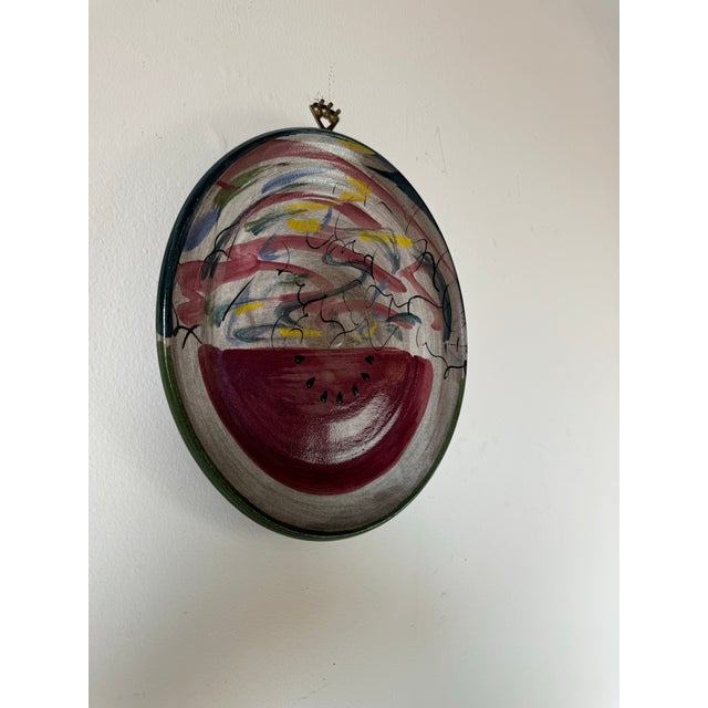 Here is a wonderful Vintage Postmodern style hand painted abstract design ceramic pottery wall art. Signed on the back by...