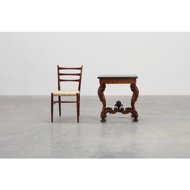 A refined example of late 19th‑century french craftsmanship, this napoleon iii style side table combines sculptural...