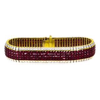 Late 20th Century Invisibly Set 18k Ruby Bracelet For Sale