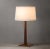 Bring the timeless beauty of mid-century modern design to your space with the Taper Table Lamp. With its classic dark...